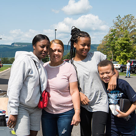 family outside on move in day